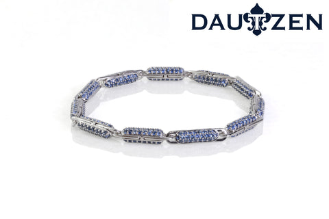 Silver bracelet capsule with embedded gems on all links
